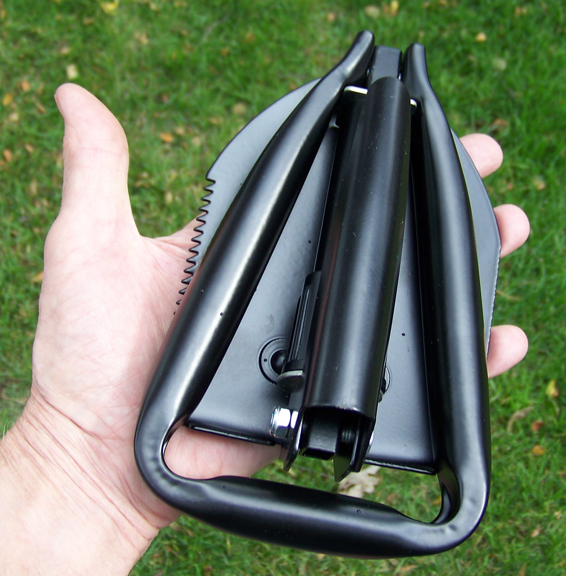 Very small folding shovel for survival packs. 